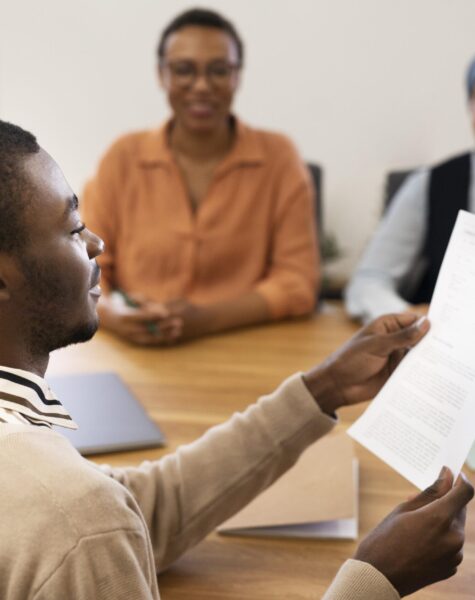 man-holding-contract-his-new-office-job-after-interview